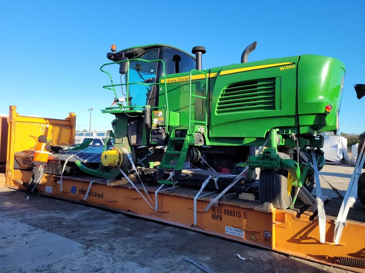 John Deere W260 Windrower Export — 40ft Flat Rack to Jebel Ali, UAE